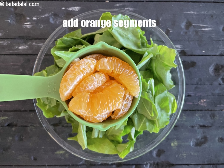 Step 13 – Add&nbsp;<meta charset="UTF-8" />1&nbsp;cup&nbsp;<a href="glossary-orange-segments-116i">orange segments</a>. Oranges provide natural sweetness to the salad.