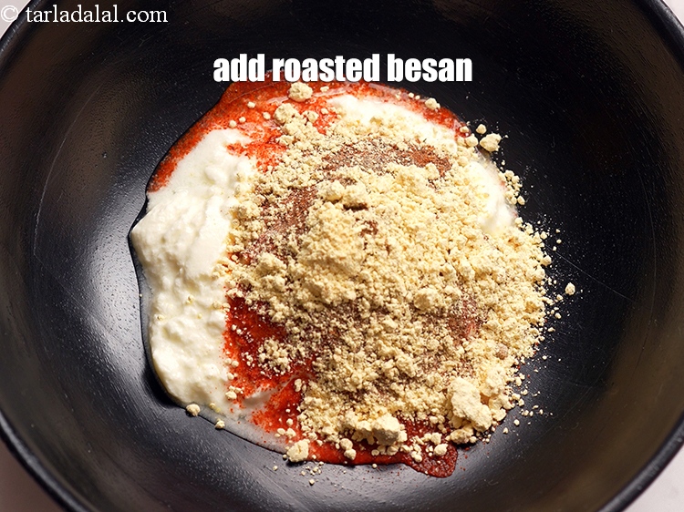 Step 12 – Add 1 tbsp <a href="https://www.tarladalal.com/glossary-besan-chana-dal-flour-bengal-gram-flour-952i" target="_blank">roasted besan (bengal gram flour)</a>.