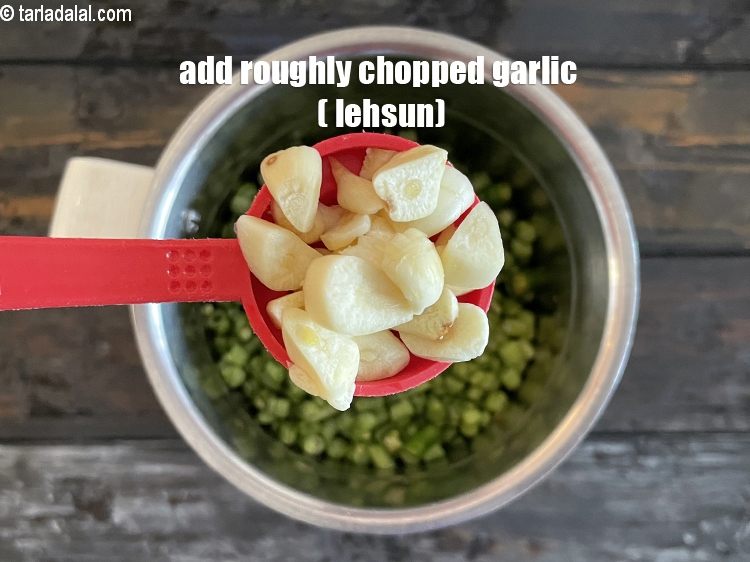 Step 13 – Add&nbsp;<meta charset="UTF-8" />2 tbsp&nbsp;roughly&nbsp;<a href="glossary-chopped-garlic-790i">chopped garlic (lehsun)</a>.