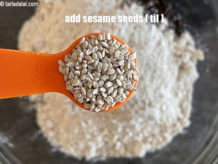Step 13 – Add&nbsp;<meta charset="UTF-8" />1 tsp&nbsp;<a href="glossary-sesame-seeds-til-gingelly-seeds-612i">sesame seeds (til)</a>.