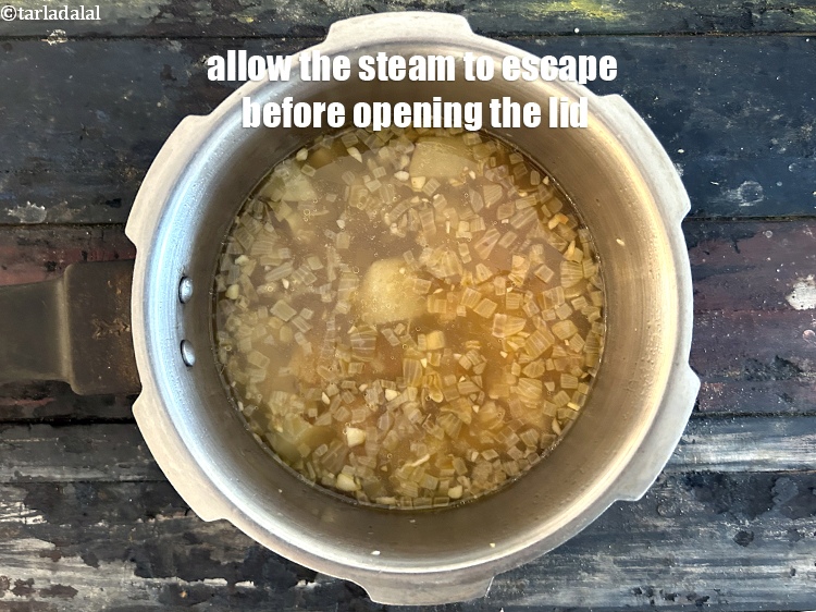 Step 13 – Allow the steam to escape before opening the lid.