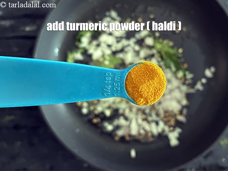 Step 55 – Add&nbsp;<meta charset="UTF-8" />1/4 tsp&nbsp;<a href="glossary-turmeric-powder-haldi-645i">turmeric powder (haldi)</a>.