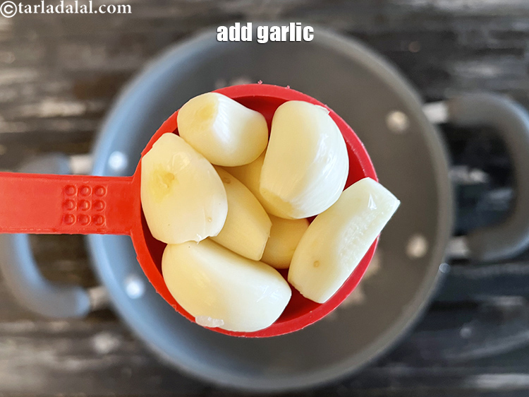 Step 21 – Add&nbsp;<meta charset="UTF-8" />7 to 8&nbsp;<a href="glossary-garlic-lehsun-lahsun-348i">garlic (lehsun)</a>&nbsp;<a href="glossary-cloves-322i">cloves (laung / lavang)</a>.