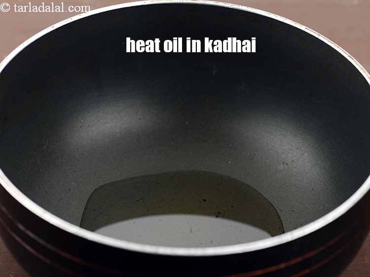 Step 16 – Heat 2 tbsp oil in a non-stick kadhai.
