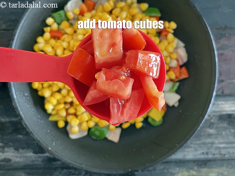 Step 19 – Add&nbsp;<meta charset="UTF-8" />1/4 cup&nbsp;<a href="glossary-tomato-cubes-728i">tomato cubes</a>.