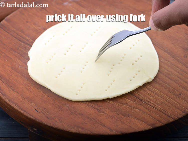 Step 13 – Prick it all over using a fork.&nbsp;