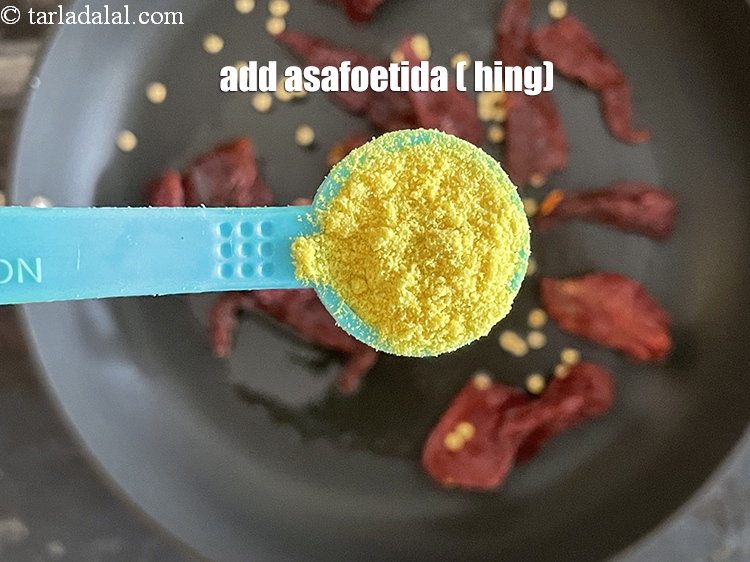 Step 12 – Add&nbsp;<!--%3Cmeta%20charset%3D%22UTF-8%22%20%2F%3E-->1/2 tsp&nbsp;<a href="glossary-asafoetida-hing-113i">asafoetida (hing)</a>.
