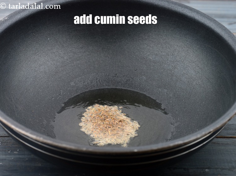 Step 12 – Add 1 tsp&nbsp;<a href="https://www.tarladalal.com/glossary-cumin-seeds-jeera-zeera-381i">cumin seeds (jeera)</a>.