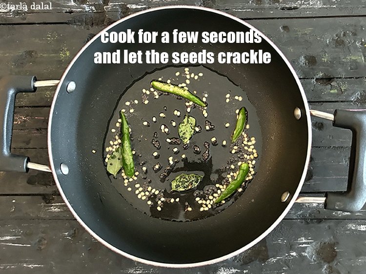 Step 18 – <p>Cook for a few seconds and let the seeds crackle.</p>