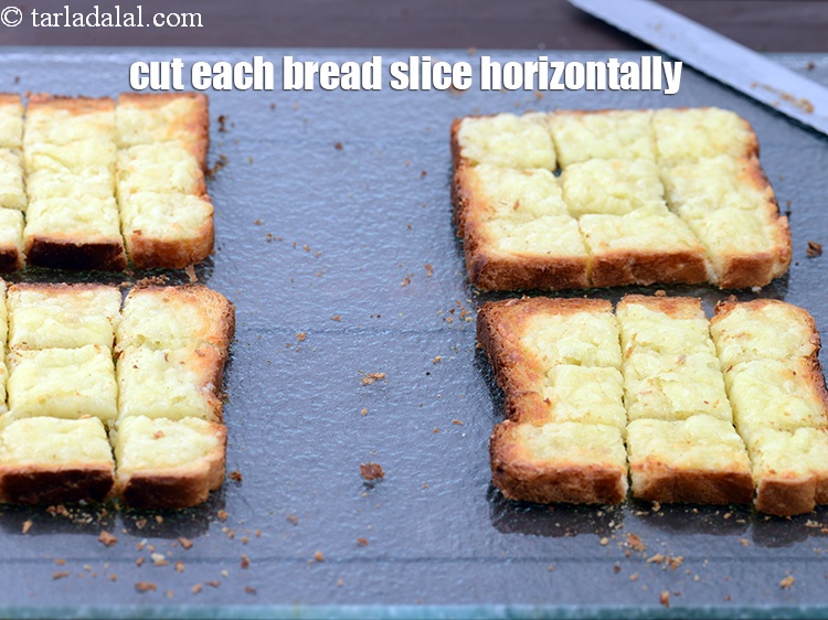 Step 11 – Cut each bread slice horizontally to make 9 equal cubes.
