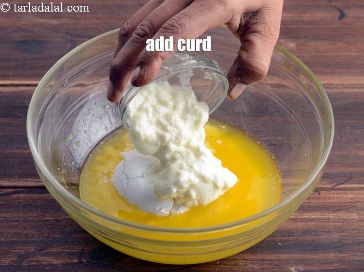 Step 14 – Add &frac14; cup <a href="https://www.tarladalal.com/glossary-curd-dahi-yogurt-yoghurt-383i">curd (dahi)</a>.