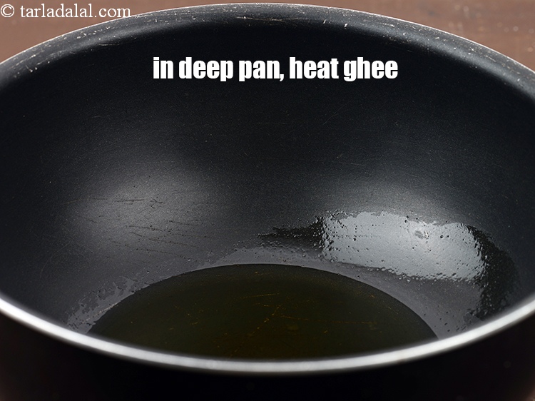 Step 12 – In a deep non stick pan, heat 3 tbsp ghee.