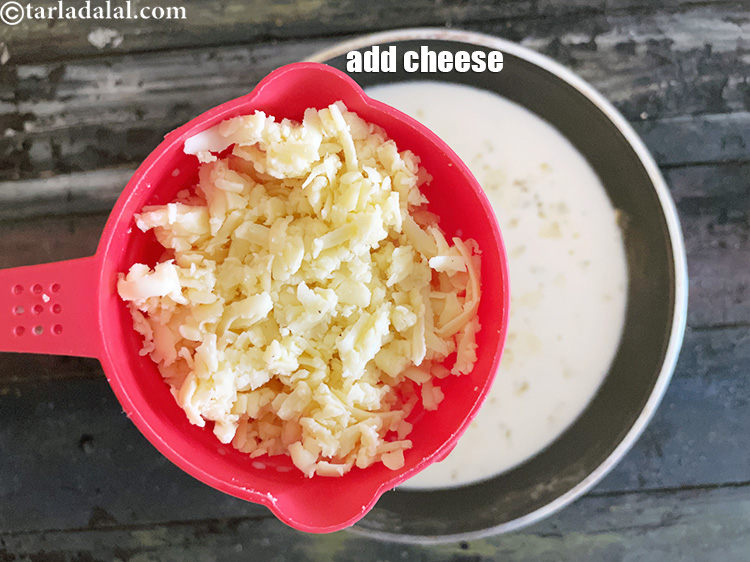 Step 12 – Add 3/4 cup processed cheese.