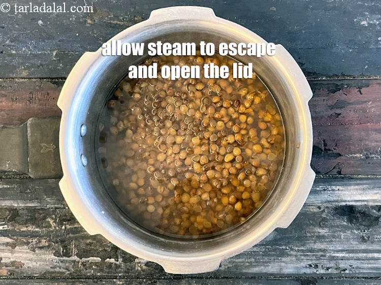 Step 20 – Allow the steam to escape before opening the lid.