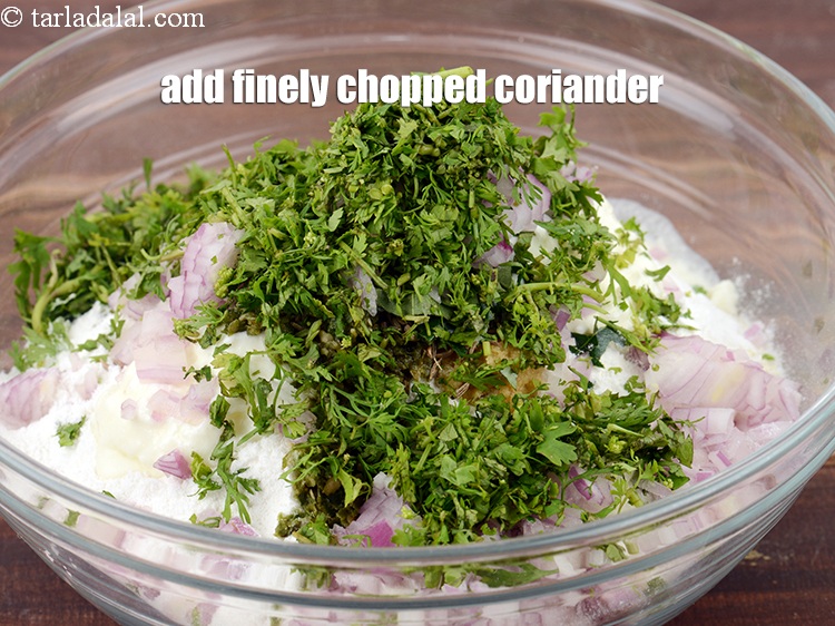 Step 12 – Add 3 tbsp finely <a href="https://www.tarladalal.com/glossary-chopped-coriander-783i">chopped coriander (dhania)</a>.