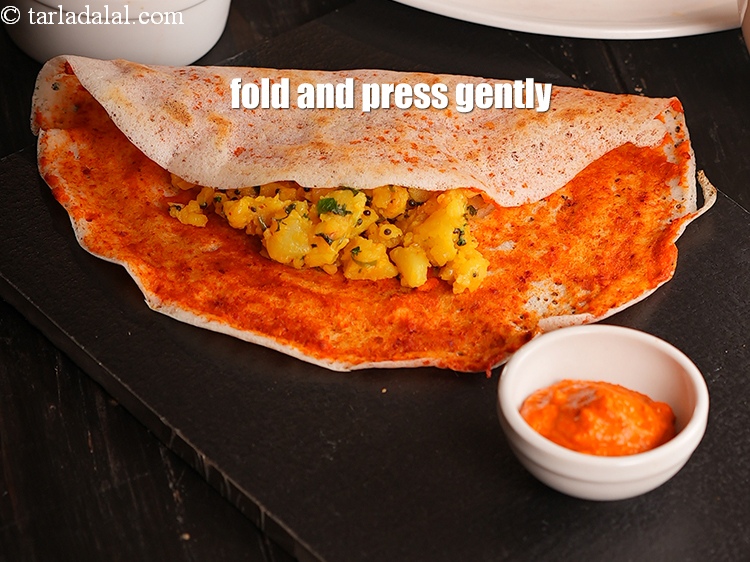 Step 74 – Fold the <meta charset="UTF-8" /><strong>Mysore masala dosa | traditional Mysore dosa | crispy&nbsp;Mysore masala dosa …