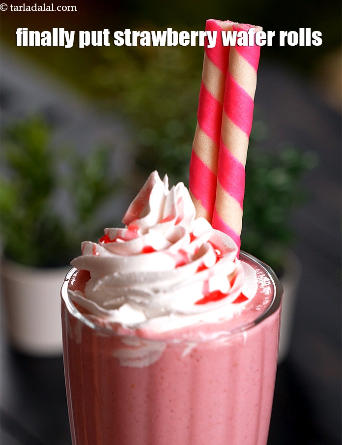 Step 12 – Finally put <a href="https://www.tarladalal.com/glossary-strawberry-wafer-rolls-2286i">strawberry wafer rolls</a>.&nbsp;