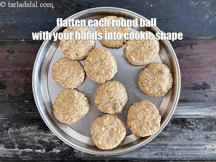 Step 13 – Flatten each ball between your palms to form a thick disc shaped cookie.