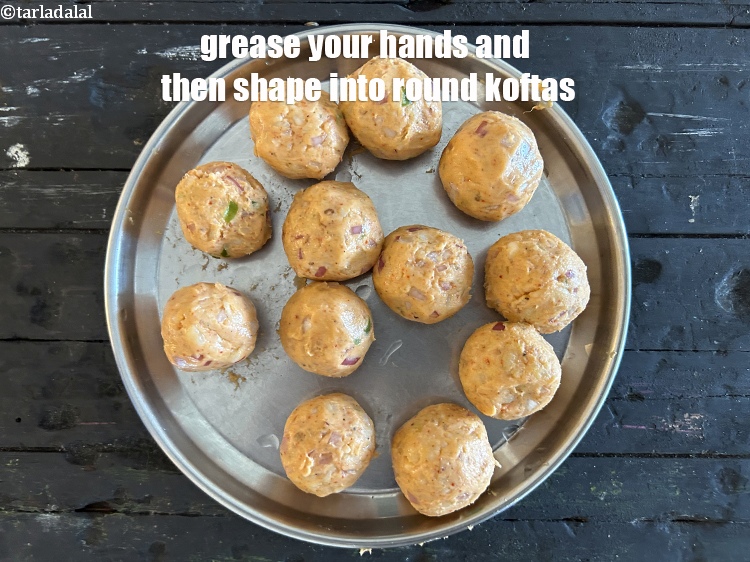 Step 51 – Grease your hands and then shape into round koftas.&nbsp;