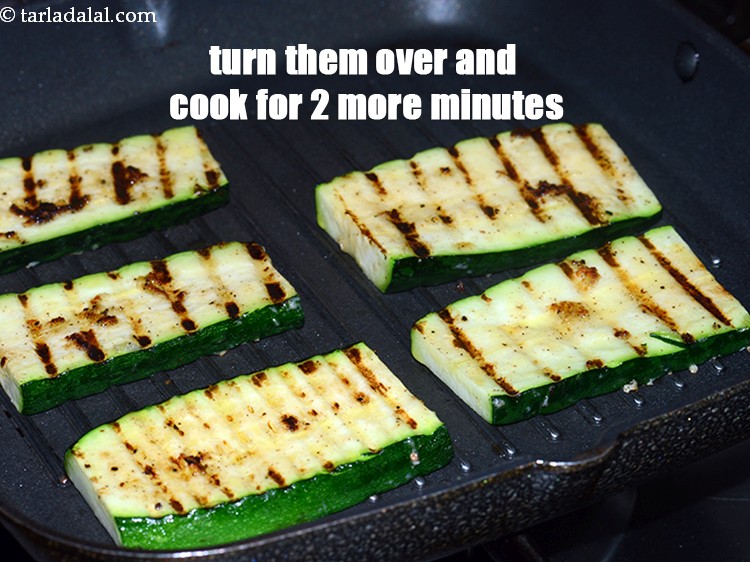 Step 12 – Turn them over and cook on a medium flame for 2 more minutes.