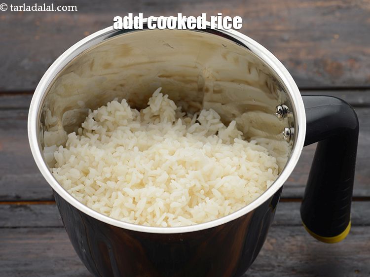 Step 16 – Add&nbsp;1 cup&nbsp;<a href="https://www.tarladalal.com/cooked-rice-32639r">cooked rice</a>&nbsp;(chawal).&nbsp;
