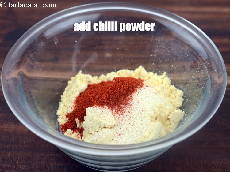 Step 15 – Add &frac12; tsp <a href="https://www.tarladalal.com/glossary-chilli-powder-red-chilli-powder-339i">chilli powder</a>.