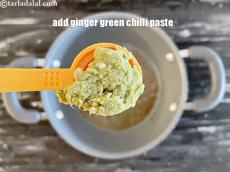 Step 19 – Add&nbsp;<meta charset="UTF-8" />1 tsp&nbsp;<a href="glossary-ginger-green-chilli-paste-adrak-mirch-ki-paste-adrak-mirchi-paste-139i">ginger-green chilli paste</a>.