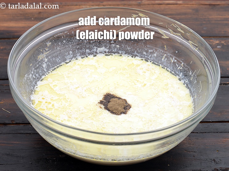 Step 13 – Add 1/4&nbsp;tsp&nbsp;<a href="https://www.tarladalal.com/glossary-cardamom-powder-elaichi-powder-265i">cardamom (elaichi) powder</a>