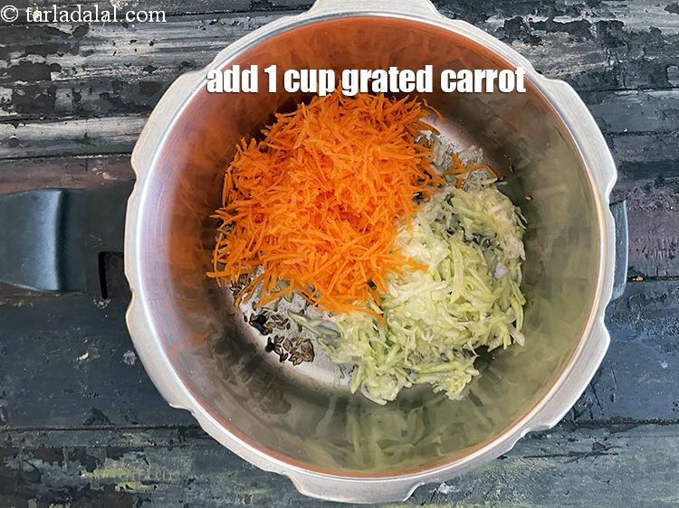 Step 21 – Add&nbsp;<meta charset="UTF-8" />1 cup&nbsp;<a href="glossary-grated-carrot-816i">grated carrot</a>.