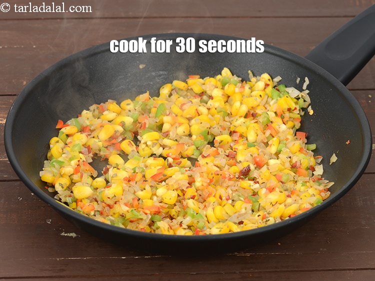 Step 12 – Cook on a medium flame for 30 seconds.&nbsp;