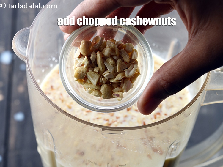 Step 12 – Add 2 tbsp <a href="https://www.tarladalal.com/glossary-chopped-cashew-nut-791i">chopped cashewnuts (kaju)</a>.