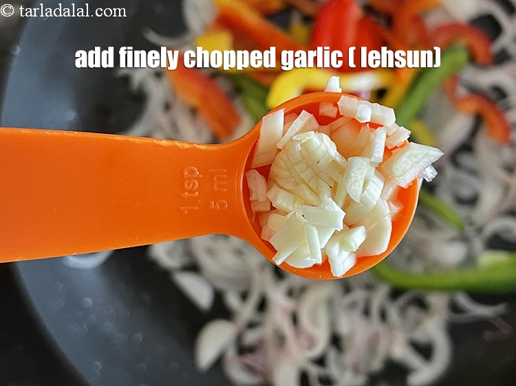 Step 12 – <p>Add 2&nbsp;tsp&nbsp;finely&nbsp;<a href="glossary-chopped-garlic-790i">chopped garlic (lehsun)</a>.</p>