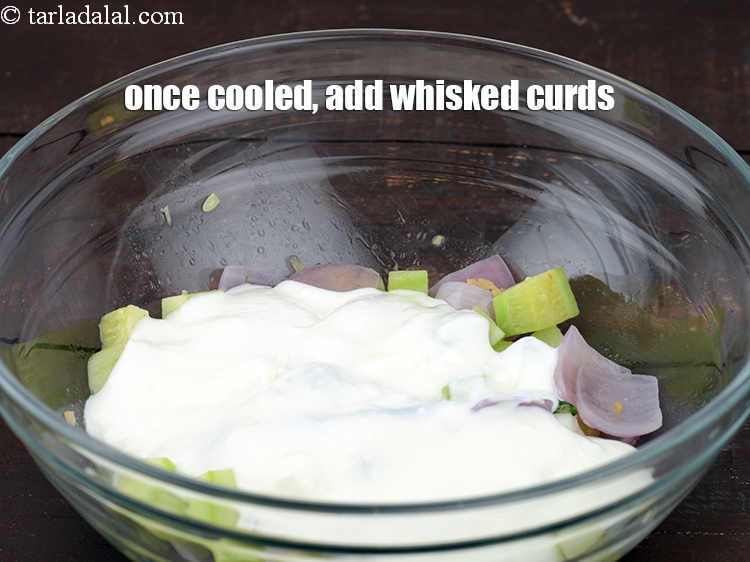Step 12 – Once cooled, add 1/2 cup <a href="https://www.tarladalal.com/glossary-whisked-curds--2096i">whisked fresh curds (dahi)</a>.