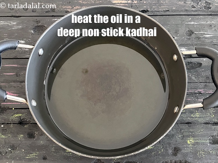 Step 19 – <meta charset="UTF-8" />Heat the oil in a deep non-stick kadhai.