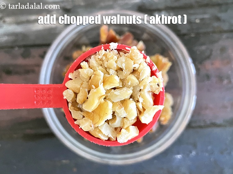 Step 14 – Add&nbsp;<meta charset="UTF-8" />2 tbsp&nbsp;<a href="glossary-chopped-walnuts-785i">chopped walnuts (akhrot)</a>