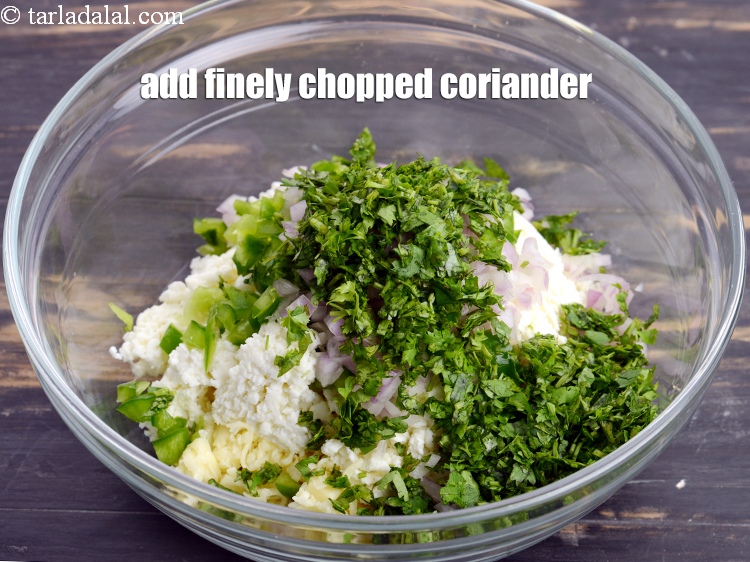 Step 13 – Add 2 tbsp finely <a href="https://www.tarladalal.com/glossary-chopped-coriander-783i">chopped coriander (dhania)</a>.
