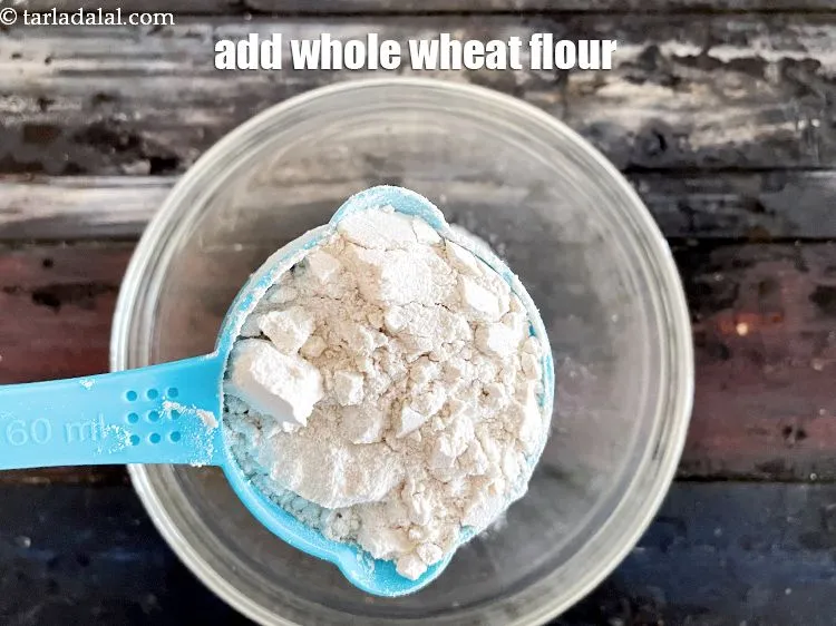 Step 23 – Add&nbsp;<meta charset="UTF-8" />1/2 cup&nbsp;<a href="glossary-whole-wheat-flour-gehun-ka-atta-gehun-ka-aata-429i">whole wheat flour (gehun ka atta)</a>.