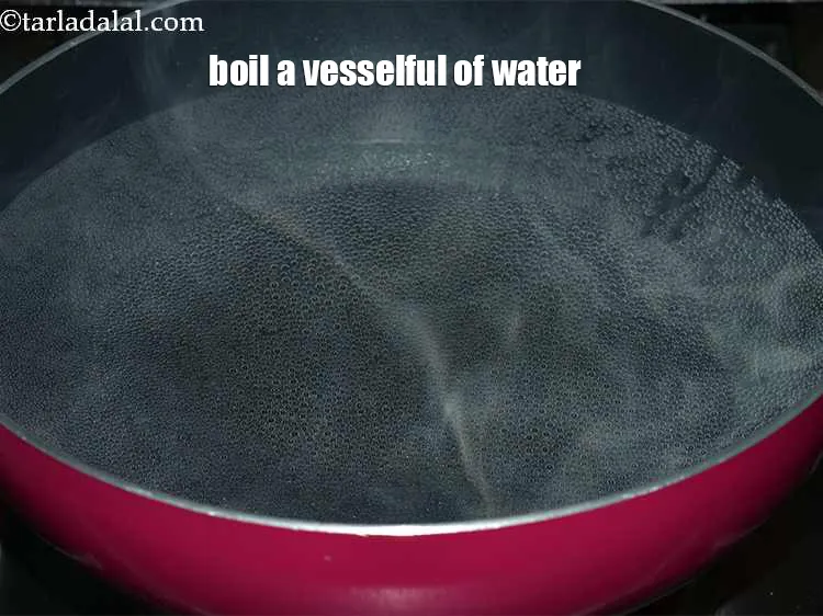 Step 12 – To make&nbsp;<strong>Fresh Tomato Pulp&nbsp;recipe |&nbsp;Fresh Tomato Pulp&nbsp;|&nbsp;Fresh Tomato Pulp&nbsp;at home |</strong>&nbsp;boil a vesselful of water …