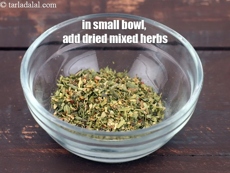 Step 12 – In a small bowl, add 1 1/2 tsp&nbsp;<a href="https://tarladalal.com/glossary-dried-mixed-herbs-466i">dried mixed herbs</a>.