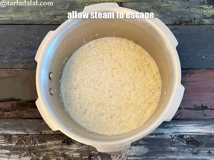 Step 17 – Allow the steam to escape before opening the lid.