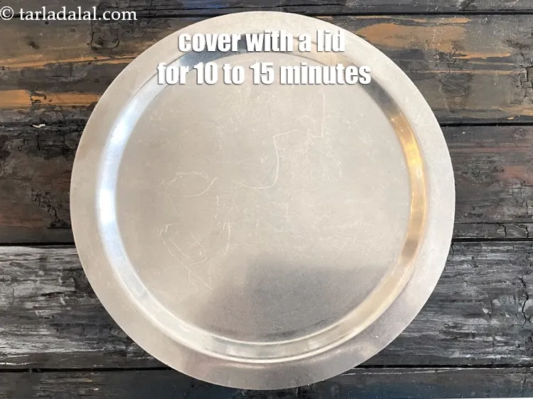 Step 12 – Cover with a lid and keep aside for 10 to 15 minutes.