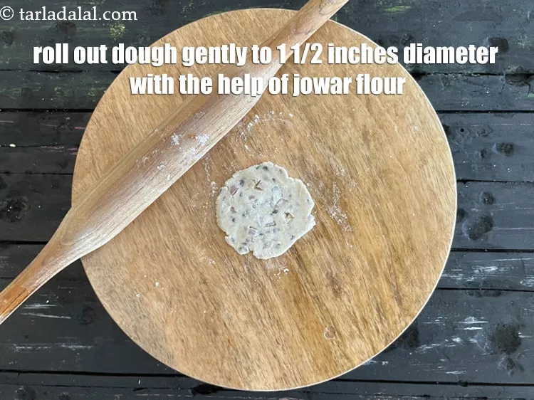 Step 13 – <p>Roll each portion of the dough &nbsp;into a 38 mm. (1½") diameter circle on a …