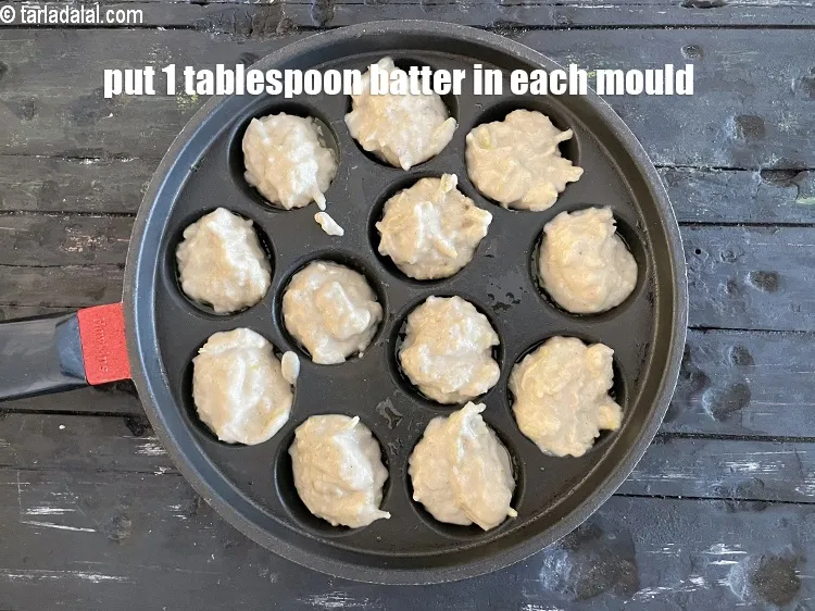 Step 15 – Put 1 tbsp of the batter into each of the&nbsp;appe moulds.