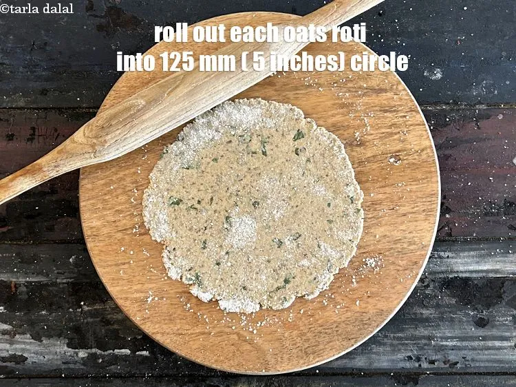 Step 13 – <meta charset="UTF-8" />Roll out each portion of&nbsp;<strong>Oats Roti</strong>&nbsp;into a 125 mm. (5") diameter circle.