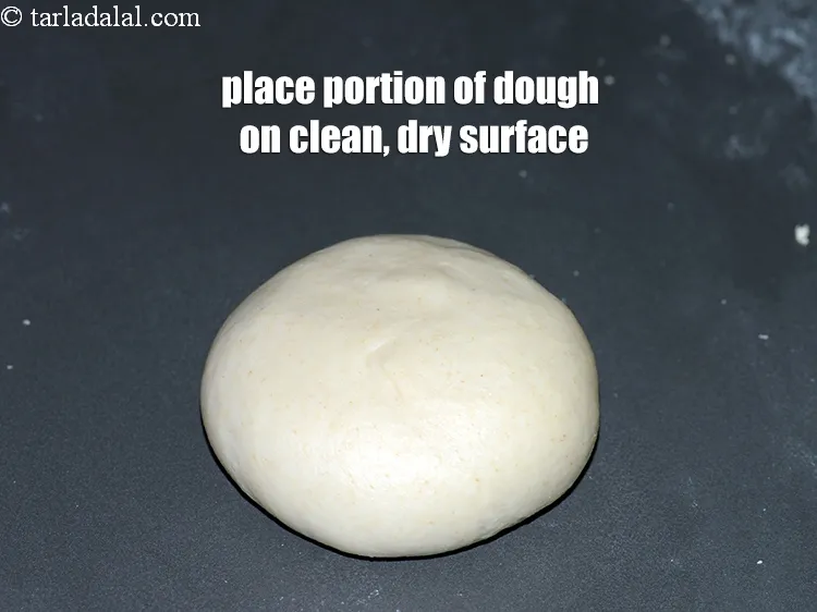 Step 13 – Place a portion of the dough on a clean, dry surface.