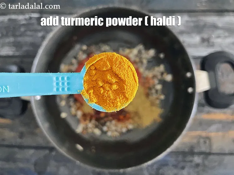 Step 15 – Add&nbsp;<meta charset="UTF-8" />1/2 tsp&nbsp;<a href="glossary-turmeric-powder-haldi-645i">turmeric powder (haldi)</a>.