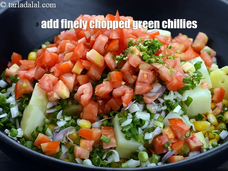 Step 12 – Add 1/2 tsp&nbsp;finely&nbsp;<a href="https://www.tarladalal.com/glossary-chopped-green-chilli-820i">chopped green chillies</a>.&nbsp;