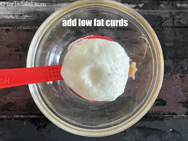Step 13 – Add&nbsp;<meta charset="UTF-8" />1 tbsp&nbsp;<a href="glossary-low-fat-curds-low-cal-dahi-low-calorie-curd-low-fat-yogurt-1107i">low fat curds (dahi)</a>.