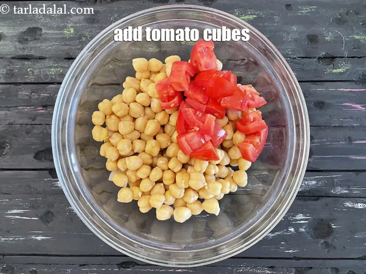 Step 21 – Add&nbsp;<meta charset="UTF-8" />1/4 cup&nbsp;<a href="glossary-tomato-cubes-728i">tomato cubes</a>.