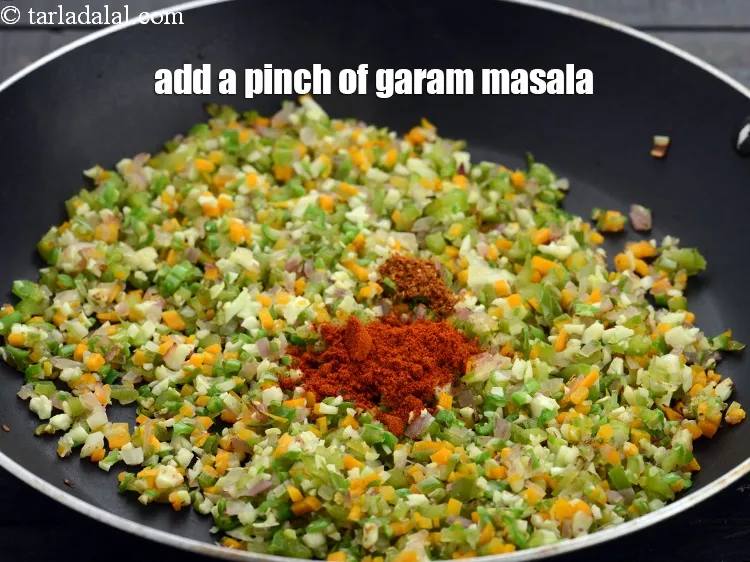 Step 12 – Add a pinch of <a href="https://www.tarladalal.com/garam-masala-163r">garam masala</a>.